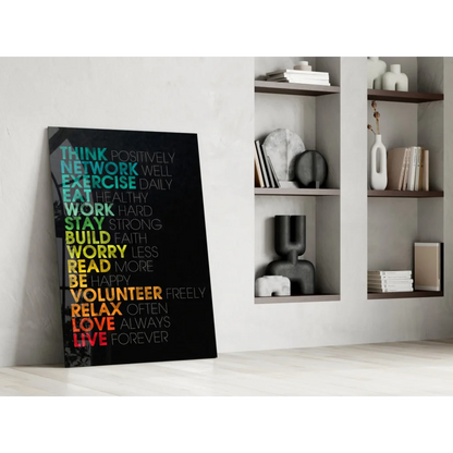 Vibrant glass wall art with colorful stacked motivational phrases