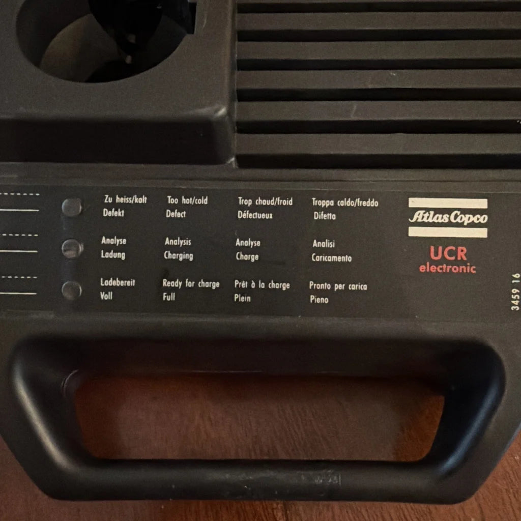 Black AEG UCR Atlas Copco 35W power tool battery with handle and status indicators