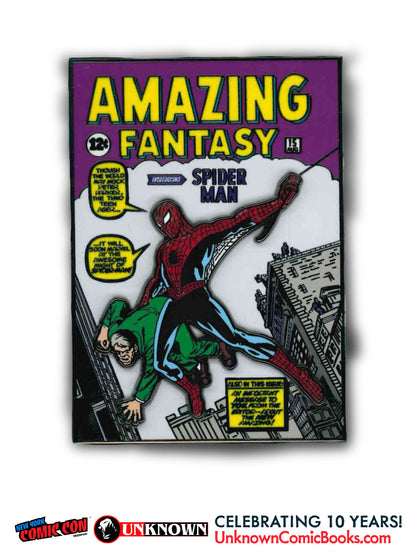 Front view of a cover-style enamel pin showing red and blue Spider-Man and a green-suited figure beneath yellow Amazing Fantasy lettering.