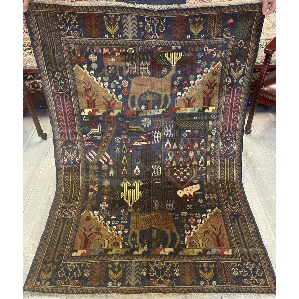 Afghani vintage pictorial Baluchi rug in dark blue with geometric and animal motifs