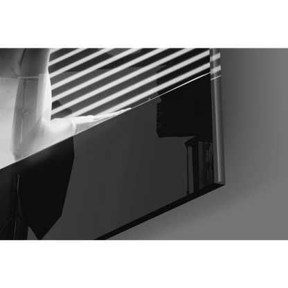 Sleek black-framed glass wall art mirror with blind shadows
