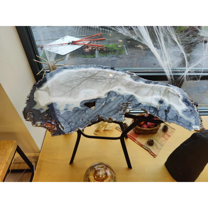 Sleek agate slab end table with swirling gray white patterns