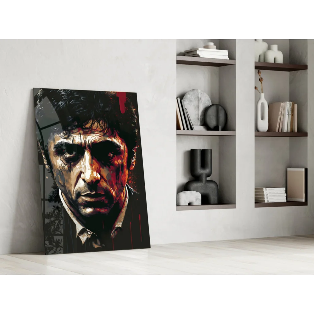Striking red black glass wall art portrait with bold features and paint splatters