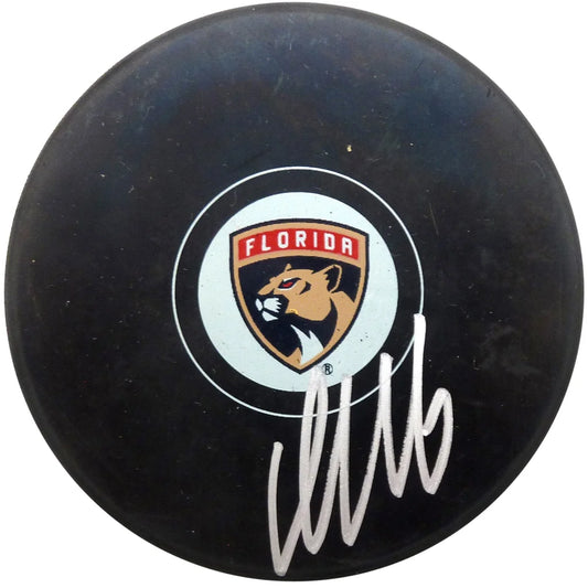 Autographed Florida Panthers hockey puck with Barkov signature and JSA