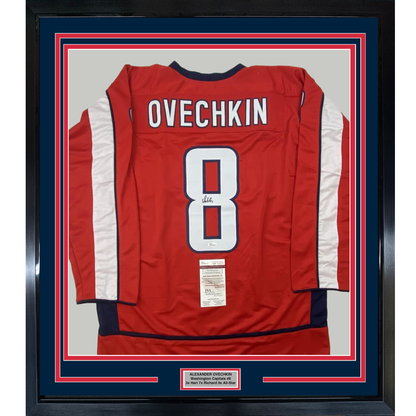 Back view of framed red Washington Capitals hockey jersey number 8 with Ovechkin nameplate and JSA authentication certificate.