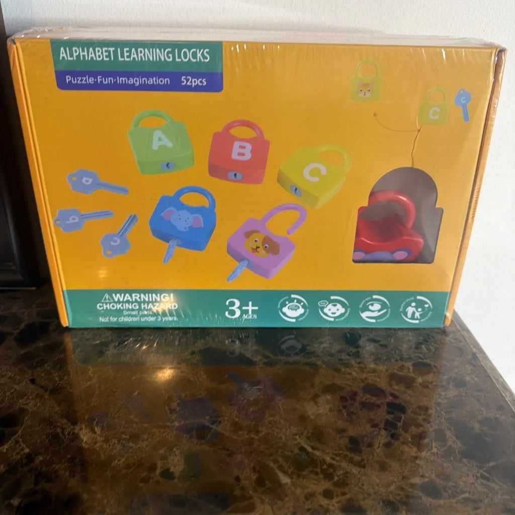 Alphabet learning lock toy set with colorful A-C locks in yellow box