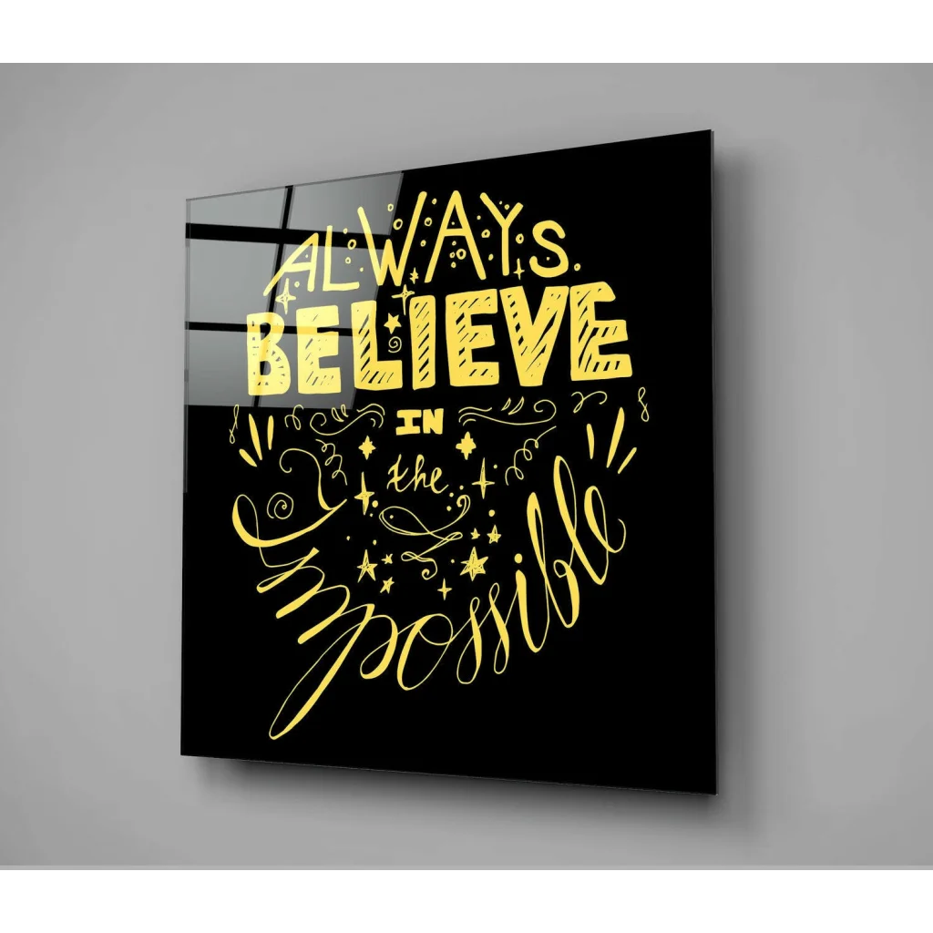 Stunning black glass wall art with gold foil quote always believe in the impossible and swirls