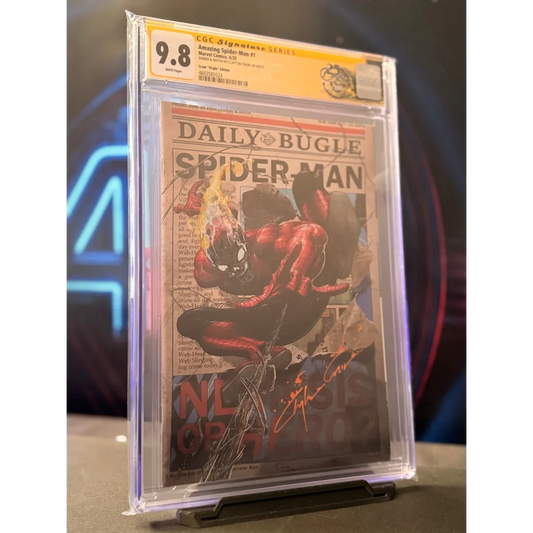 Amazing Spider-Man #75 signed comic book with red and black art in CGC 9.8 signature slab against newspaper backdrop