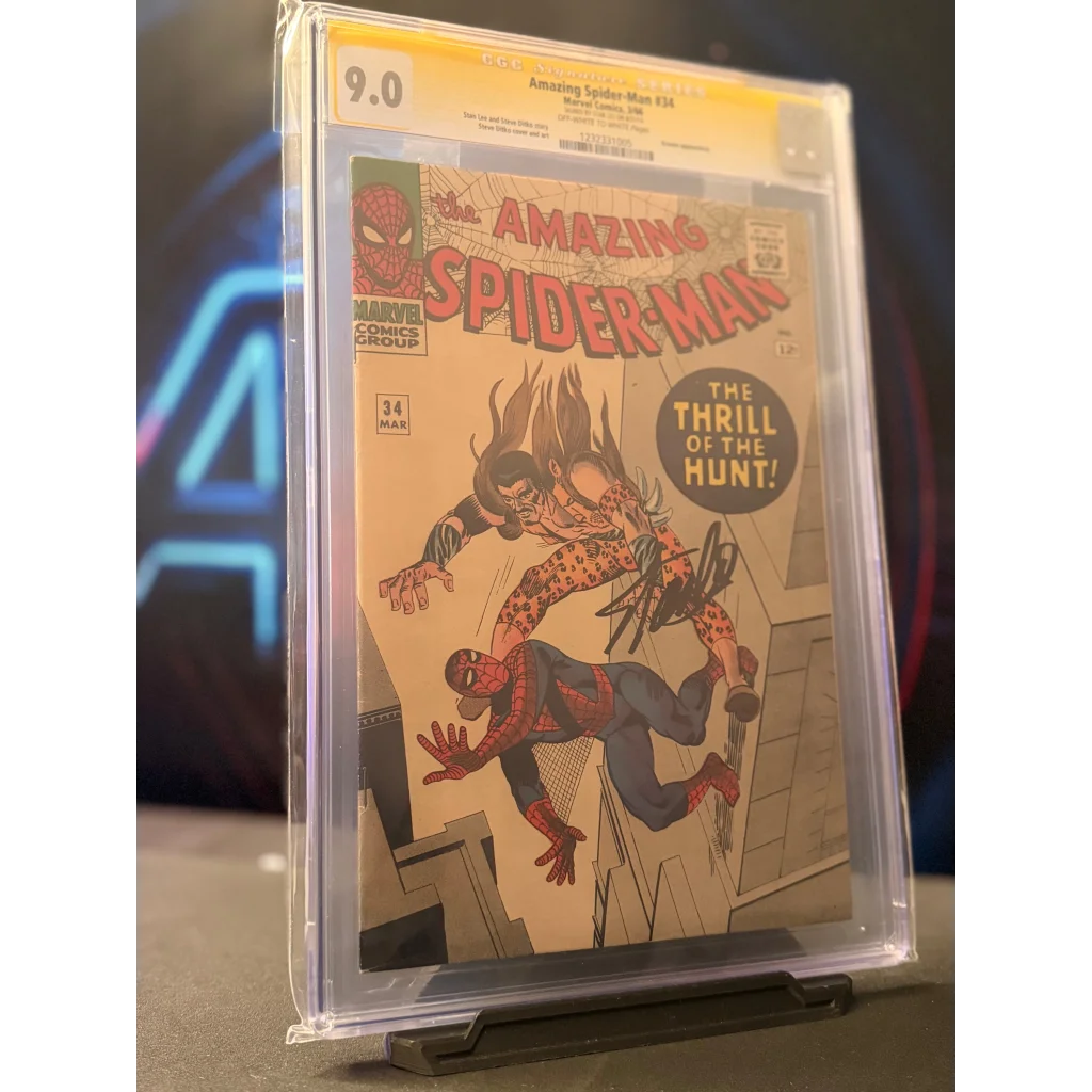A signed amazing spider-man #34 comic book with classic marvel artwork encased in a clear protective slab graded 9.0
