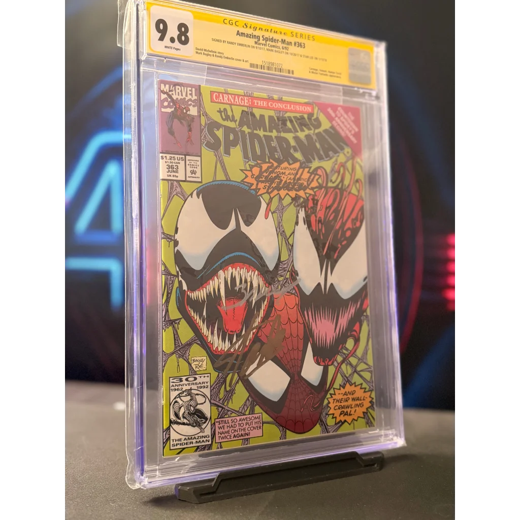 Signed amazing spider-man 383 comic in cgc 9.8 case featuring vibrant venom and carnage artwork in bold reds and blacks