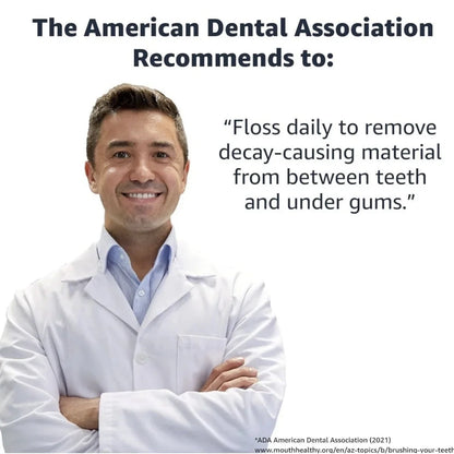 Smiling man in lab coat holding Amazon Basics mint dental flossers