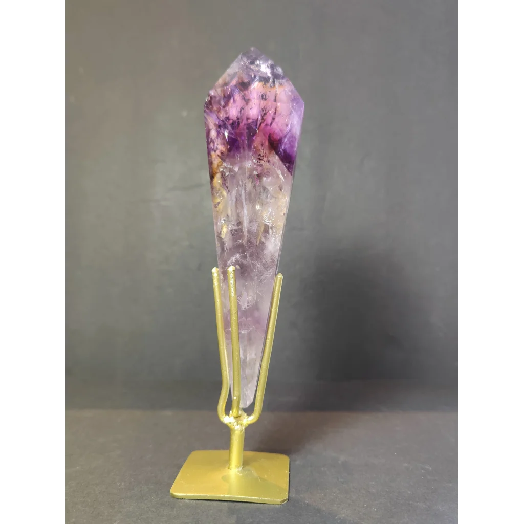 Amethyst polished scepter featuring a tall faceted crystal with purple gradient on a gold metal stand
