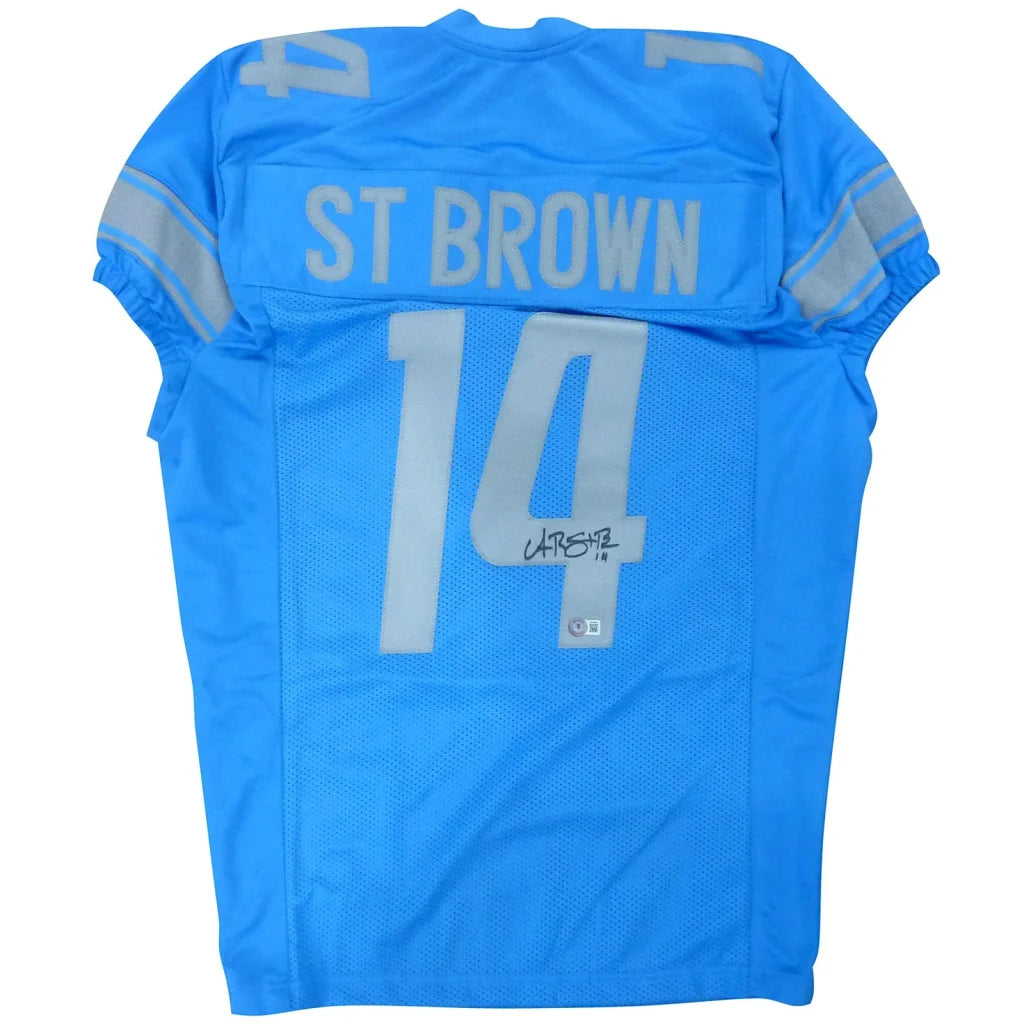 Amon-Ra St. Brown autographed custom jersey in bold blue for Detroit Lions