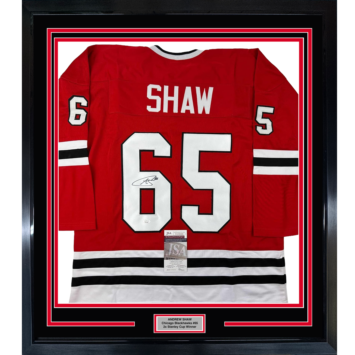 Red Chicago Blackhawks jersey #65 with Shaw name and signature displayed in black frame with red and white mat borders.