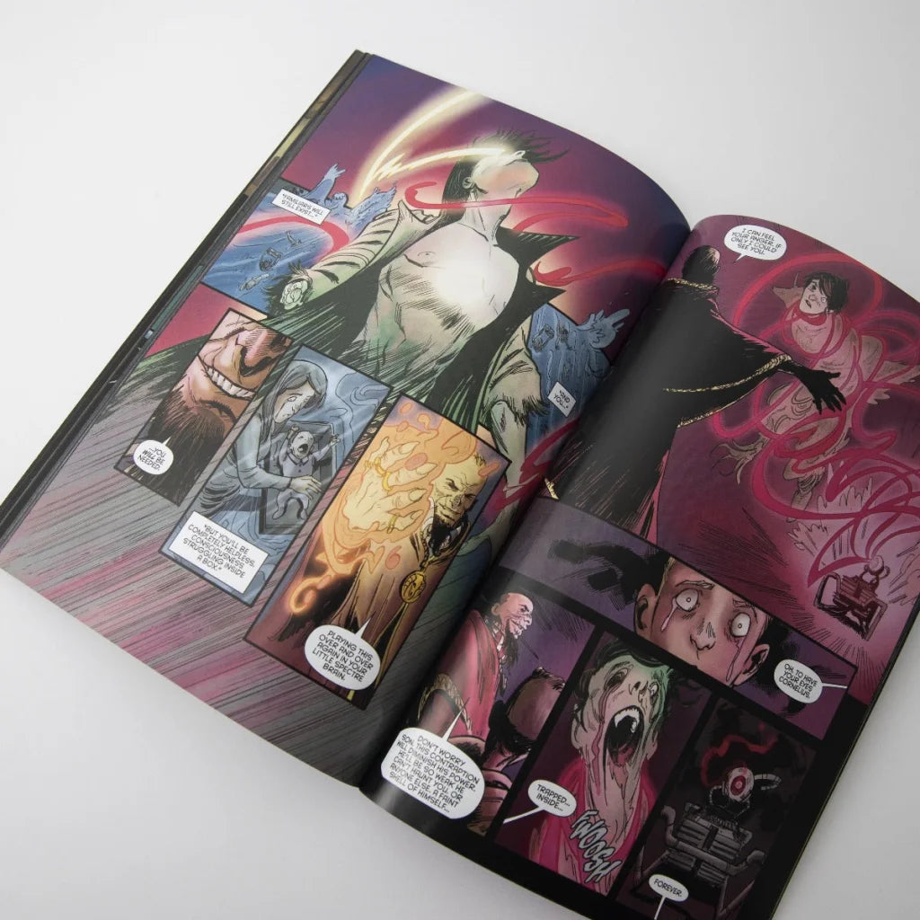 Open comic book with dark vibrant art from Andy Biersack Black Veil Brides graphic novel