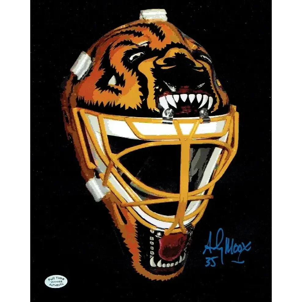 Orange and black tiger-themed hockey goalie mask with yellow cage for Andy Moog Boston Bruins collectible