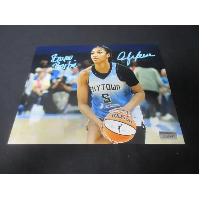Angel Reese signed 8x10 photo of female basketball player in light blue and black uniform