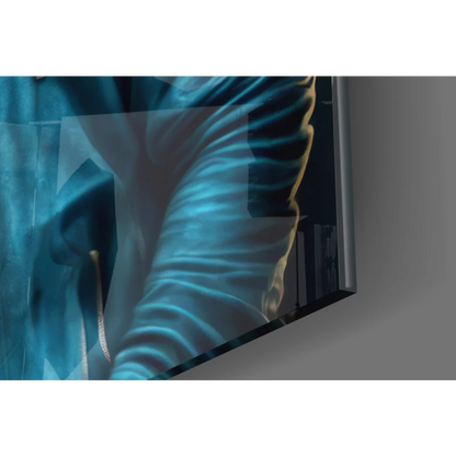 Sleek modern TV in silver frame displays vibrant blue Gorilla Headphones wall art