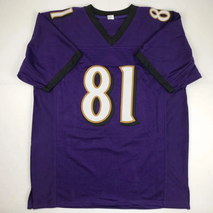 Purple Baltimore Ravens custom jersey with gold and white accents, size large, signed by Anquan Boldin