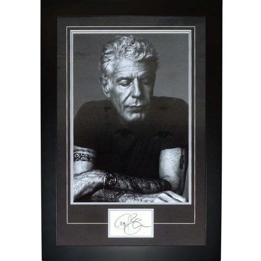 Grayscale signed Anthony Bourdain portrait in black frame with JSA autograph plaque