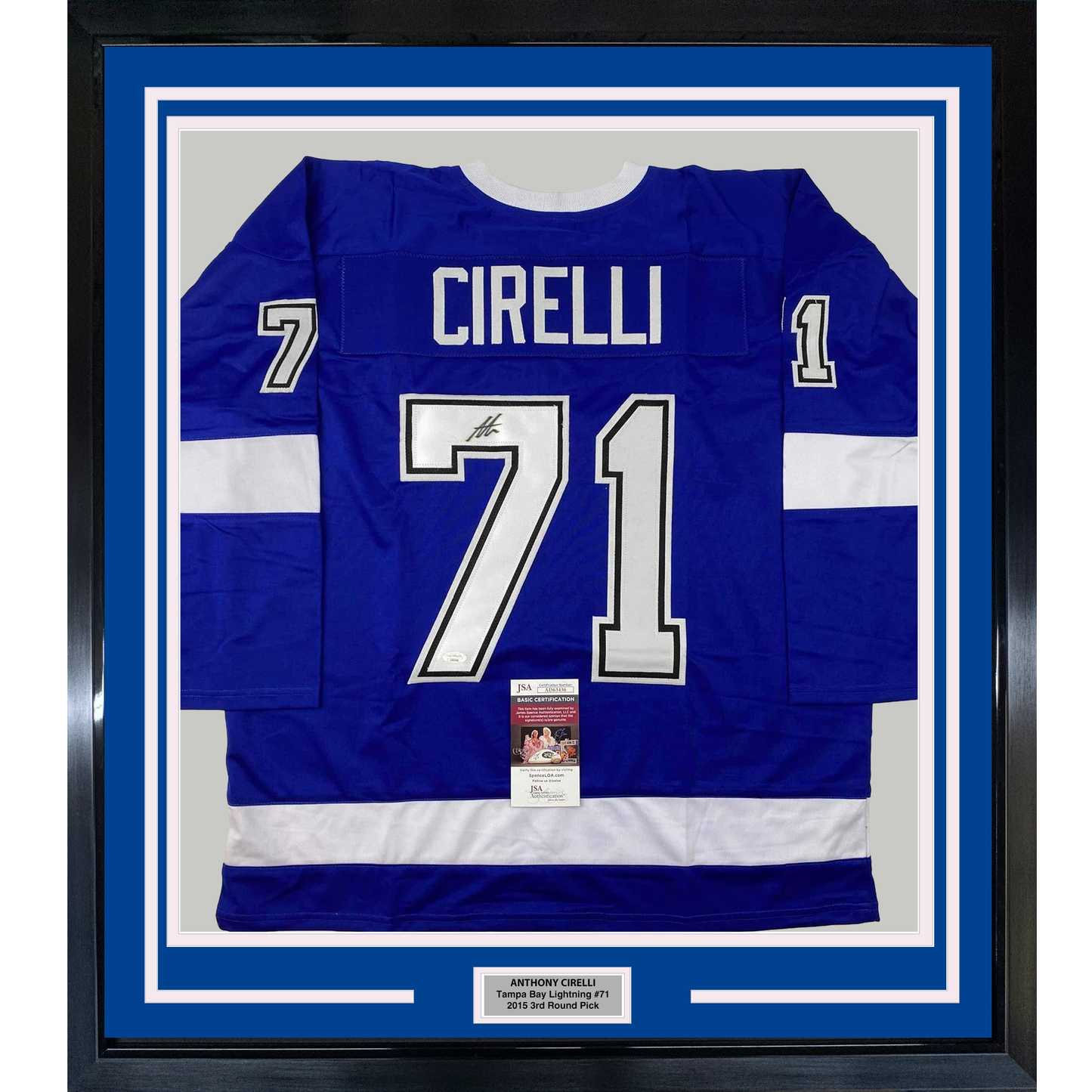 Blue Tampa Bay Lightning hockey jersey #71 signed by Anthony Cirelli, displayed flat in black frame with white matting and JSA authentication certificate.