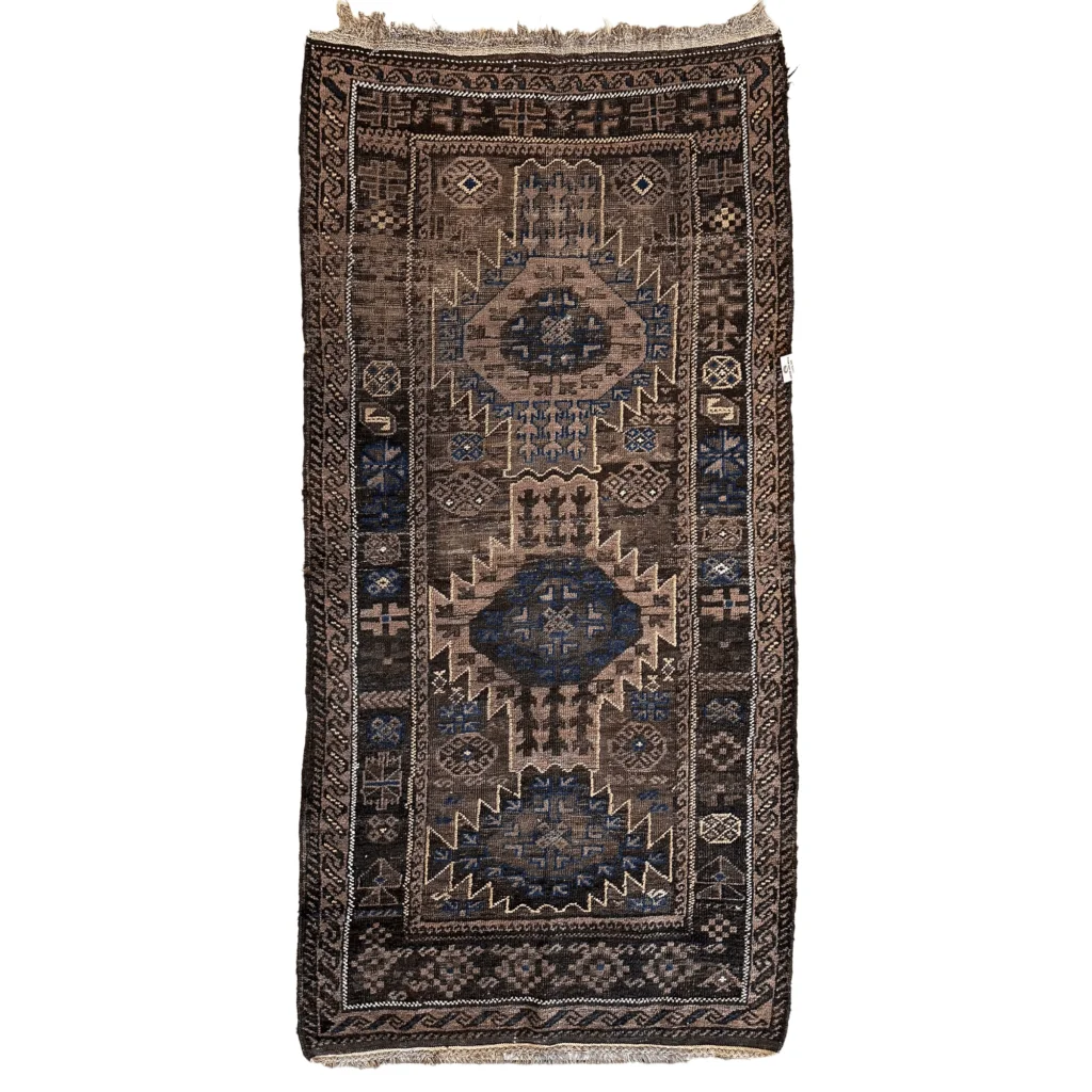 Antique 1880s primitive tribal Baluch wool rug with geometric patterns