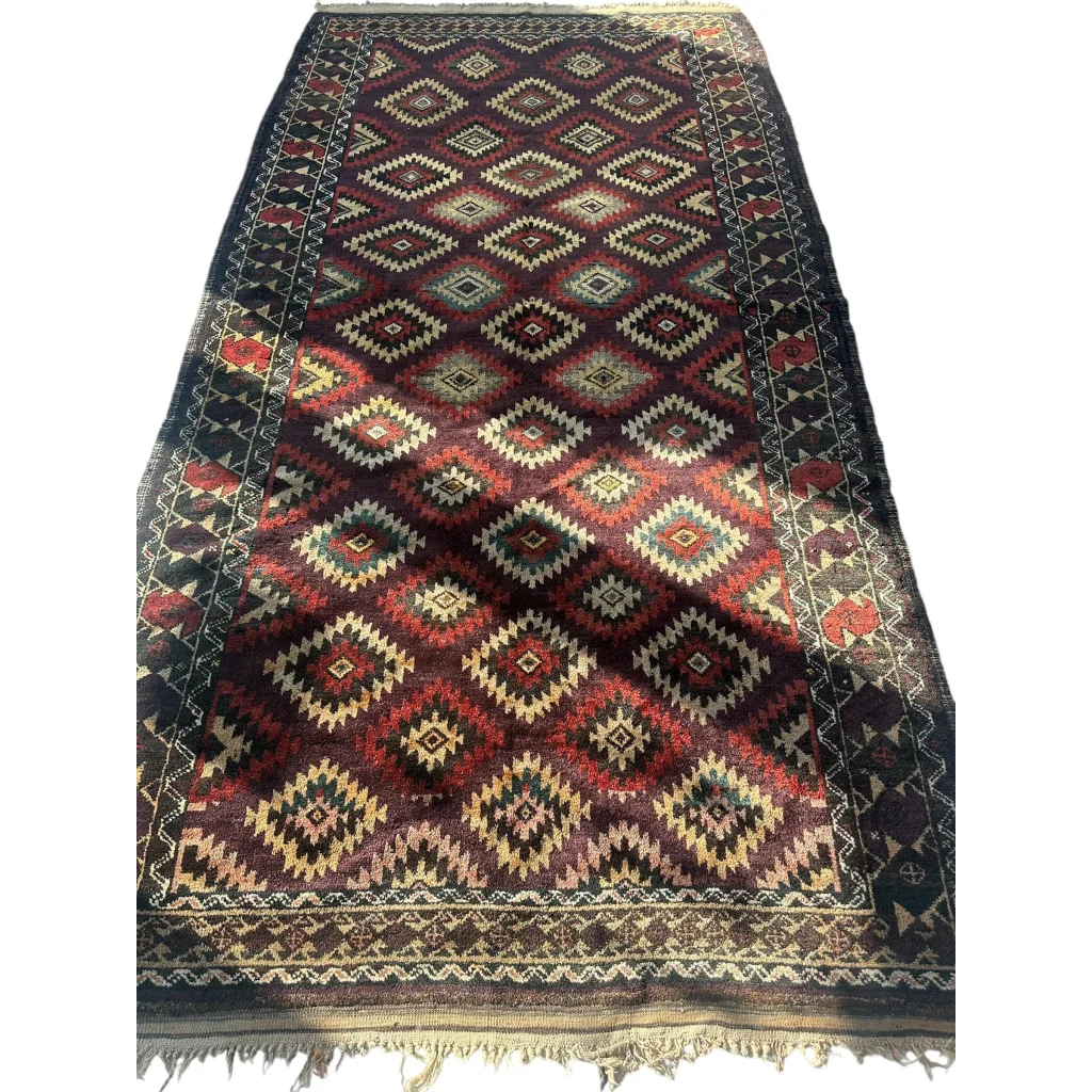 Antique 1900s tribal Baluch wool rug with geometric patterns