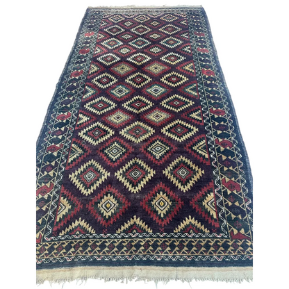 Antique 1900s tribal Baluch wool rug with geometric diamond pattern