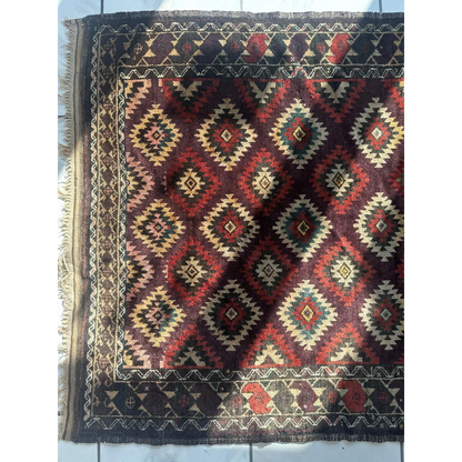 Antique 1900s tribal Baluch wool rug with dark red cream geometric patterns