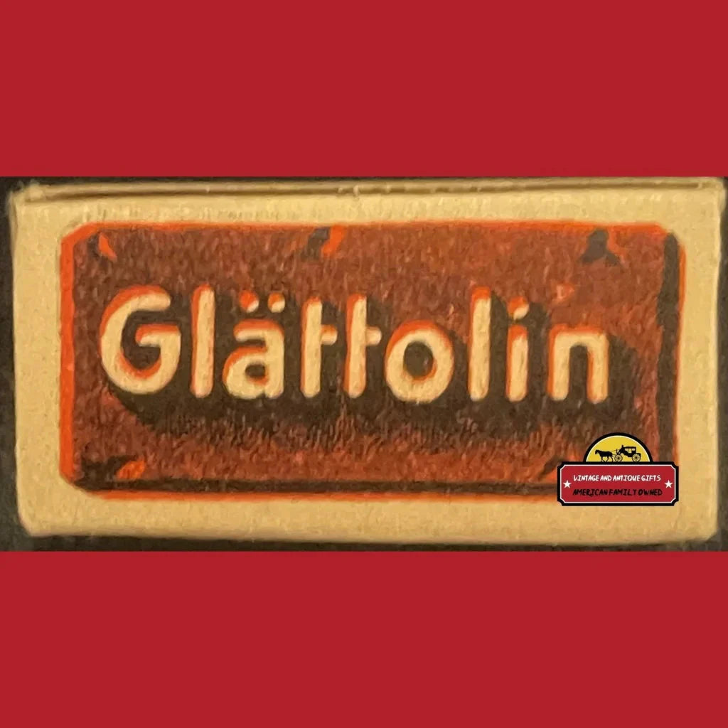 Vintage Glattolin wax collar label in raised lettering on textured background