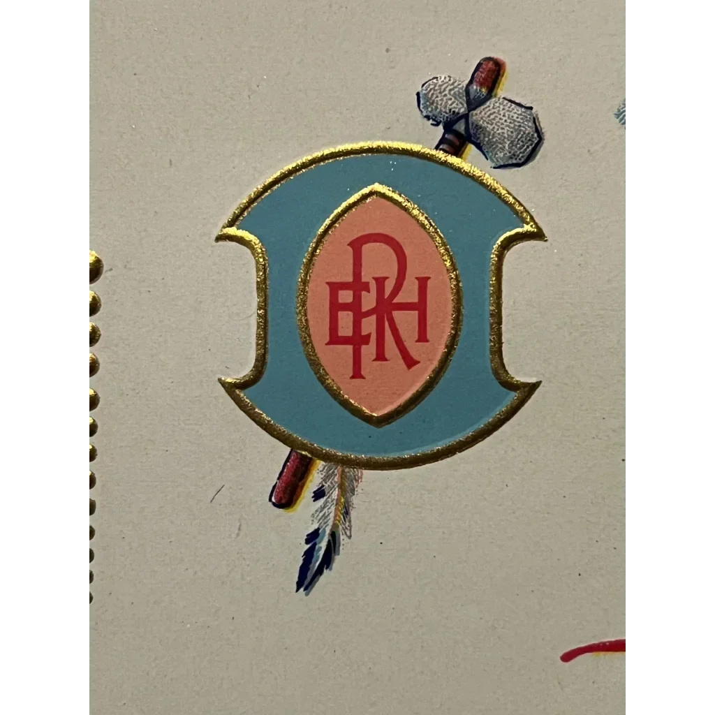 Decorative badge featuring BPR initials in a shield, showcasing Native American heritage