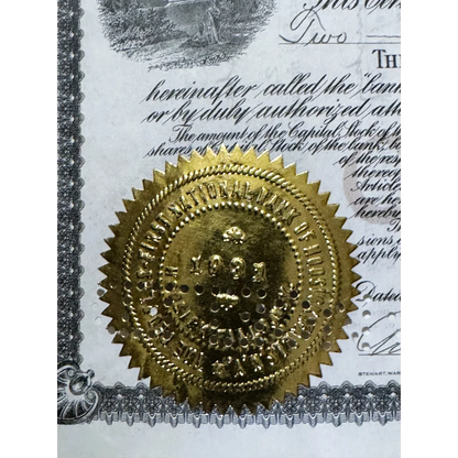 Golden embossed seal with serrated edges on antique 1930s national bank stock certificate from peopless first national bank