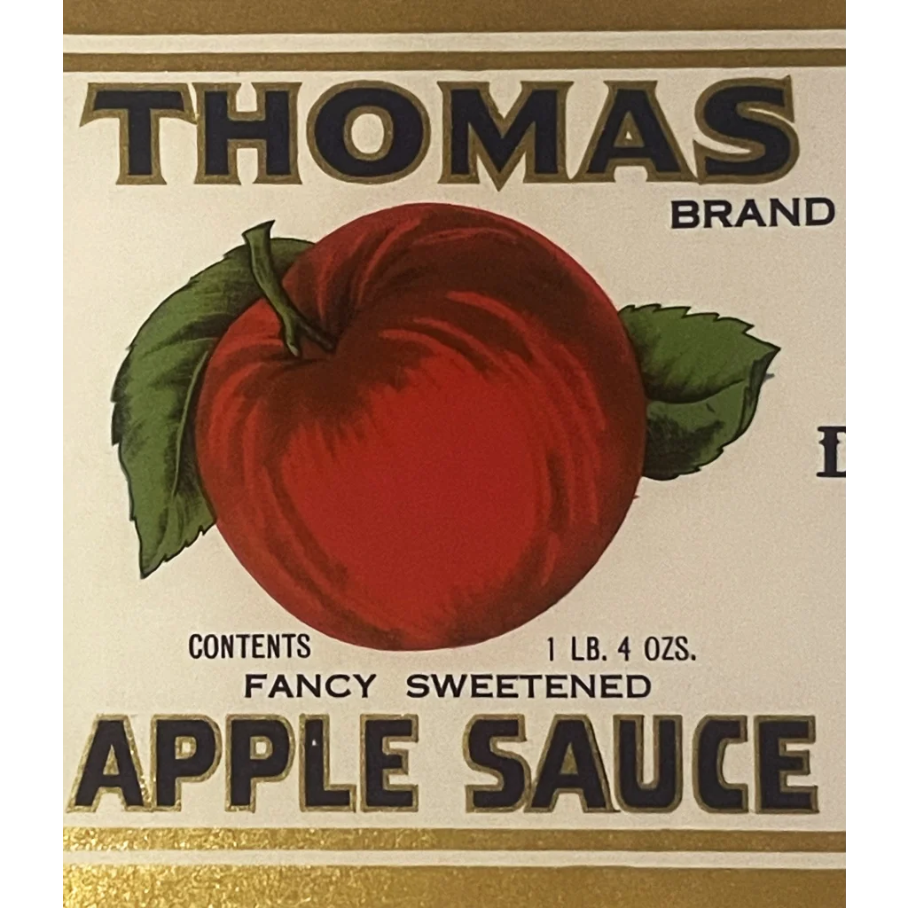 Bright red apple with green leaves for 1930s Thomas Apple Sauce label design