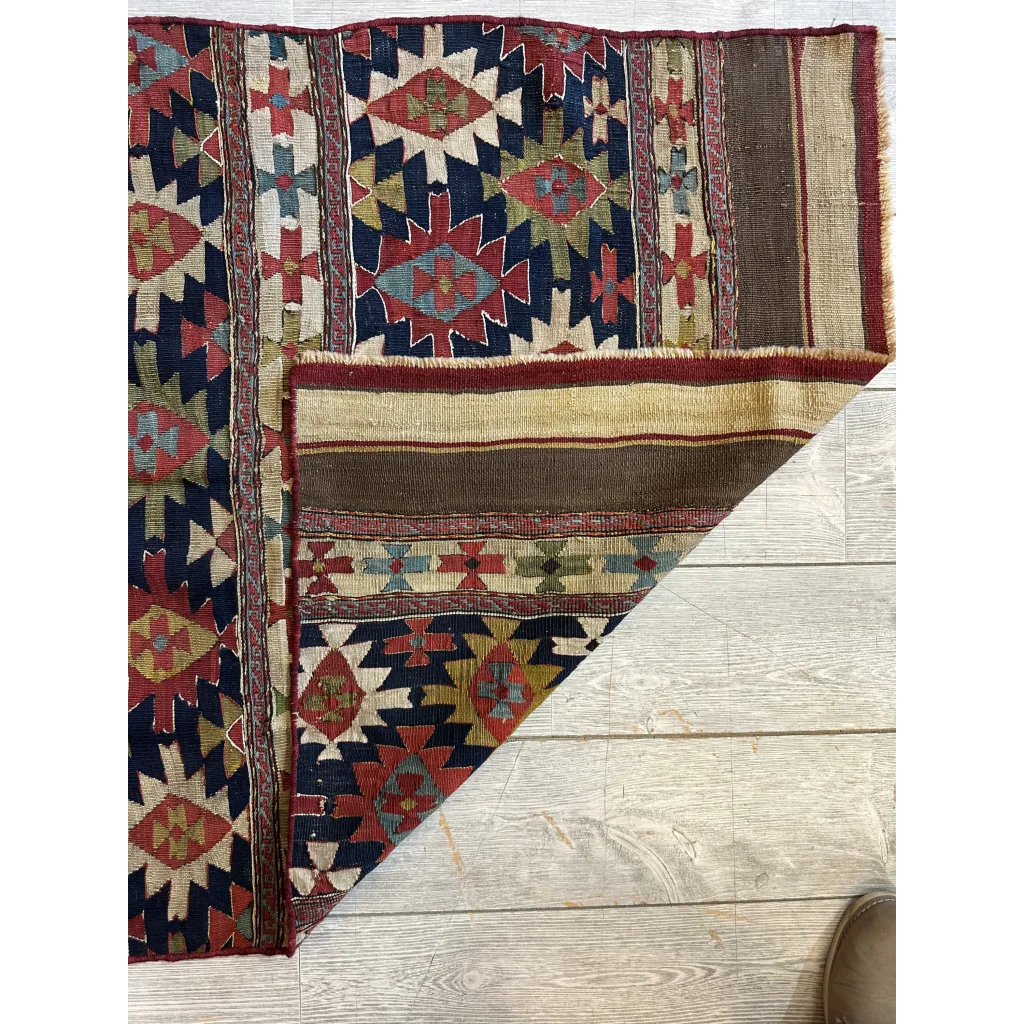 Vibrant antique 19th century Shahsavan mafrash panel rug with geometric red blue beige patterns