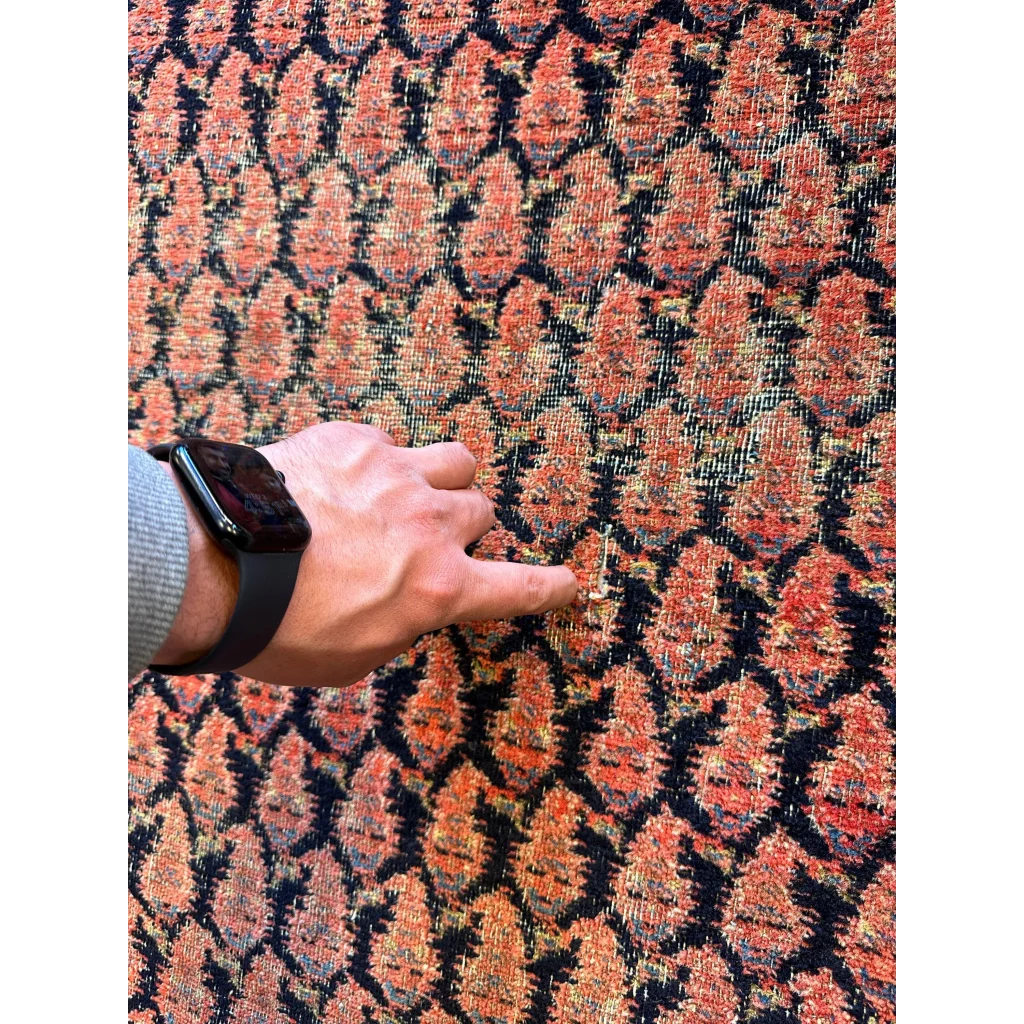 Antique 1880s Kurdish Afshar paisley runner fragment in rust-orange and navy natural wool