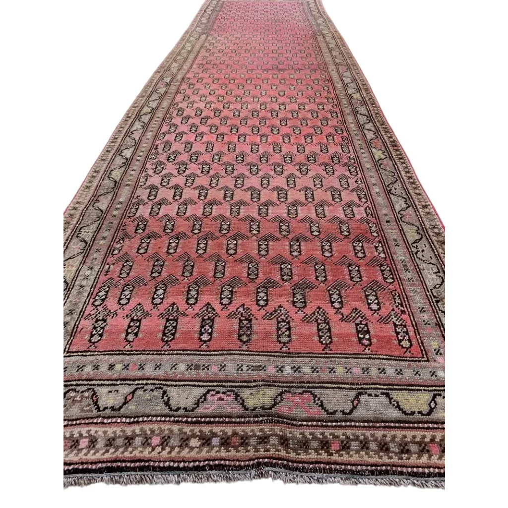 Antique Armenian Karabakh runner rug in terracotta with repeating paisley boteh pattern