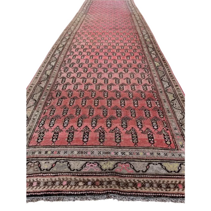 Antique Armenian Karabakh runner rug in terracotta with repeating paisley boteh pattern
