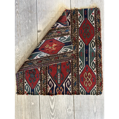 Vintage Caucasus natural wool pile rug with bold red, blue, green geometric patterns