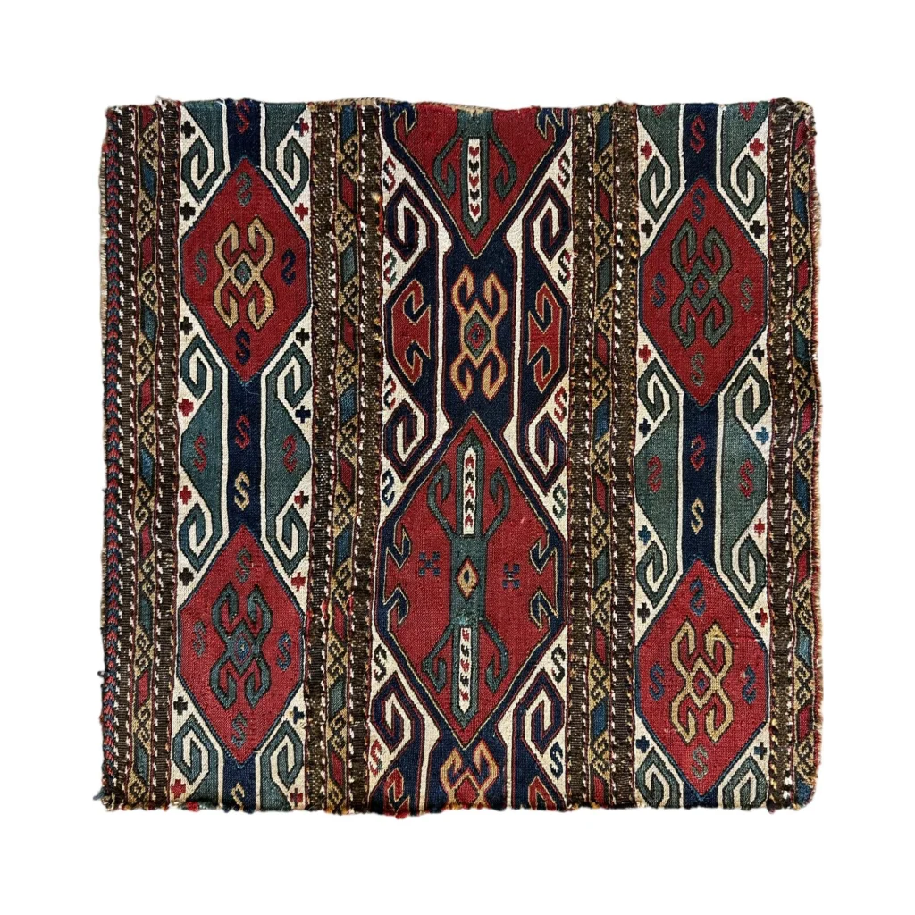 Antique Caucasus natural wool pile rug with bold red navy geometric diamonds