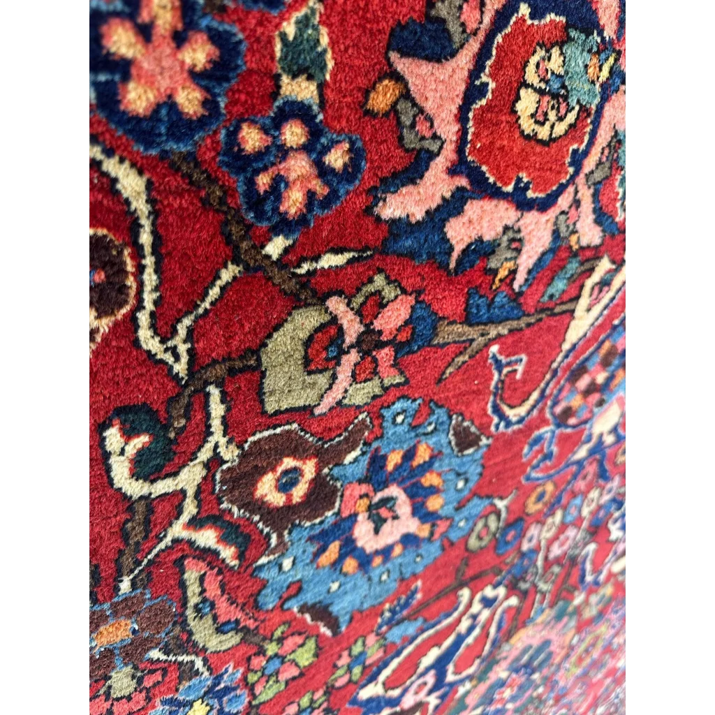 Vibrant antique Persian Bakhtiari rug with floral vine details