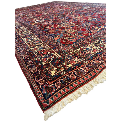 Antique Persian Bakhtiari rug with floral garden patterns in red and blue