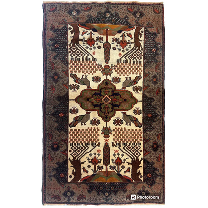 Vintage 1940s Persian Baluch wool rug with low pile geometric motifs