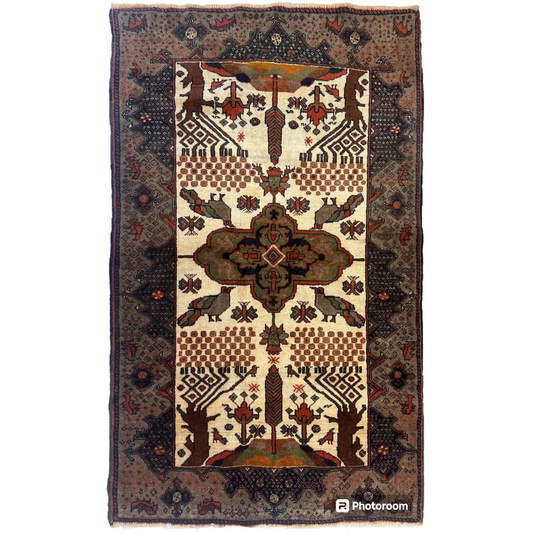 Antique Persian Baloch rug with low pile geometric motifs