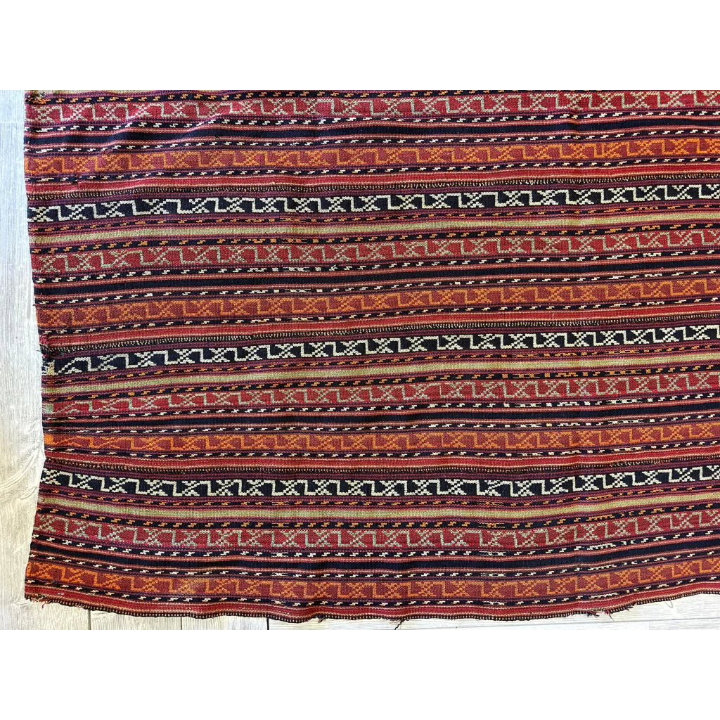 1900s Azerbaijani Shahsavan Jajim rug, detail of red orange vertical stripes and geometric motifs
