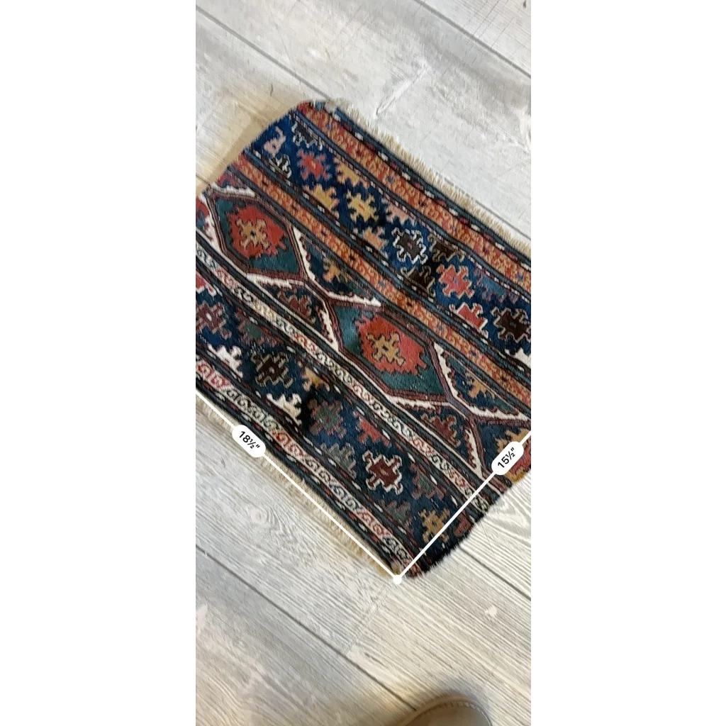 Antique tribal Shahsavan natural wool pile rug with geometric floral patterns