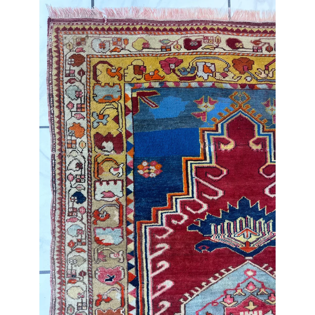 Vibrant antique Turkish Melas rug with intricate geometric patterns