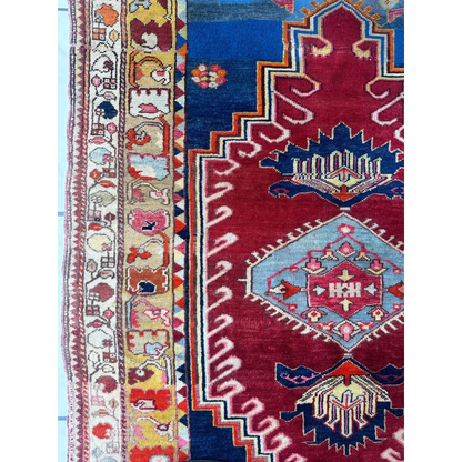 Vibrant antique Turkish Melas rug with geometric motifs