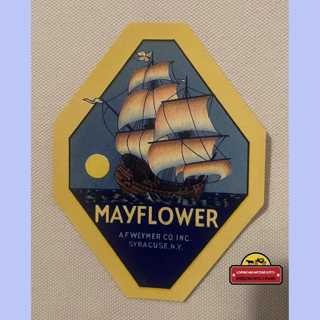 Vintage Mayflower broom label with ship and night sky, embracing American spirit