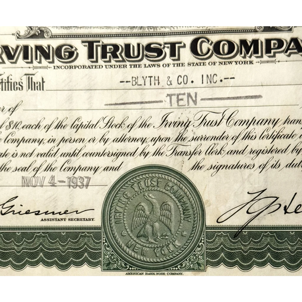 Vintage Irving Trust Company stock certificate with ornate design and green seal