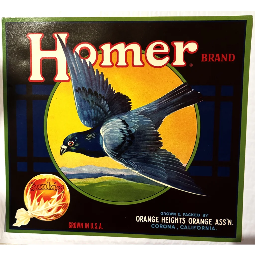 Vintage Homer Pigeons crate label with a flying bird design against a yellow circle